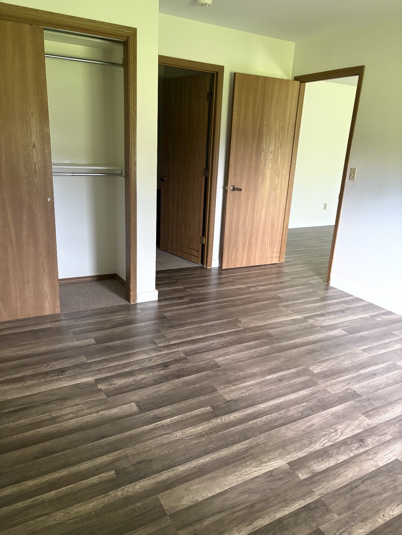 Unfurnished private apartment bedroom with closet at Spring Creek Chalet